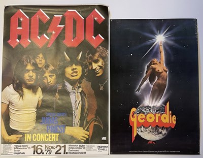 Lot 61 - AC/DC ESSEN 1979 CONCERT / GEORDIE SAVES THE WORLD POSTERS
