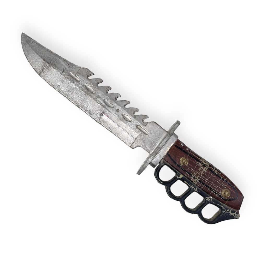 Lot 231 - JUDGE DREDD (1995) - A LIKELY SCREEN USED PROP DAGGER.