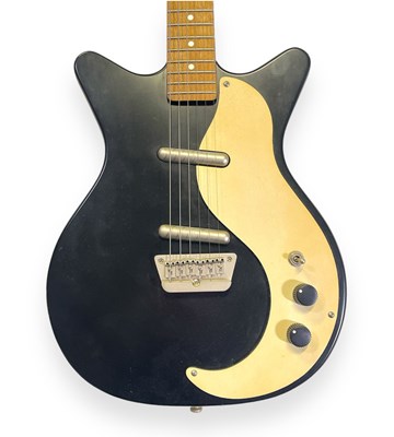 Lot 13 - A DANELECTRO ELECTRIC GUITAR.