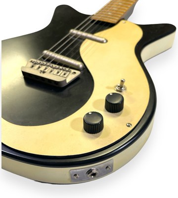 Lot 13 - A DANELECTRO ELECTRIC GUITAR.