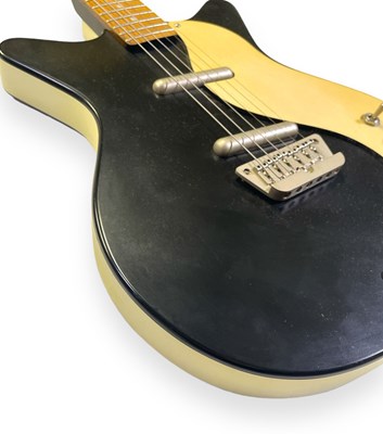 Lot 13 - A DANELECTRO ELECTRIC GUITAR.