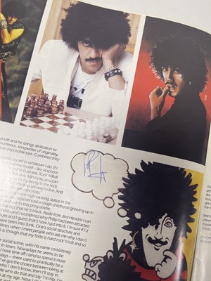 Lot 209 - THIN LIZZY - PHIL LYNOTT SIGNED TOUR PROGRAMME AND POSTER