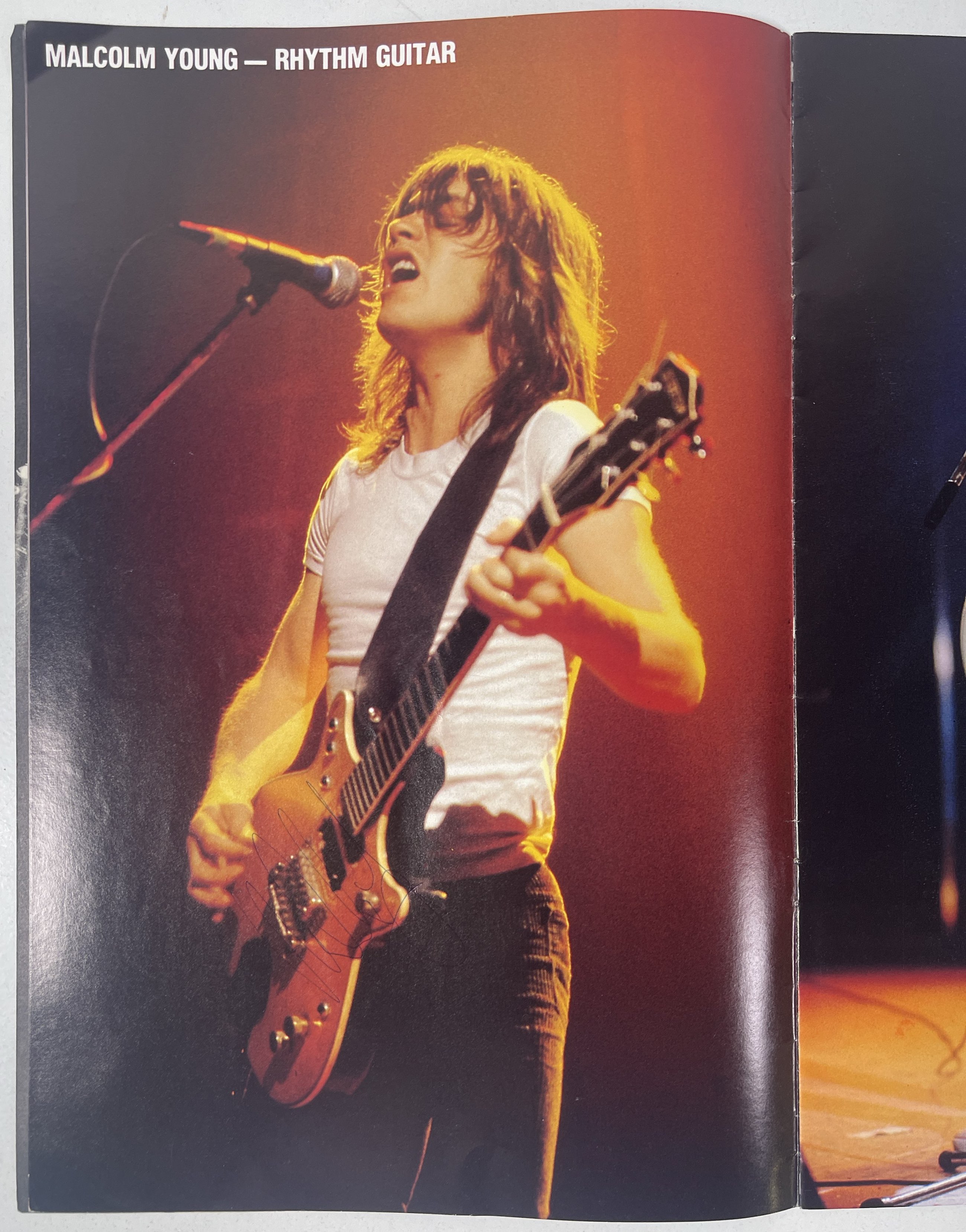 Lot 231 - AC/DC - FULLY SIGNED 1980 TOUR PROGRAMME.