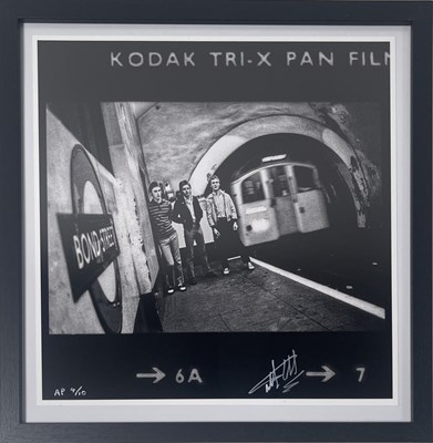 Lot 425 - THE JAM - DOWN IN THE TUBE STATION AT MIDNIGHT - PHOTOGRAPHER SIGNED LIMITED EDITION PHOTO.