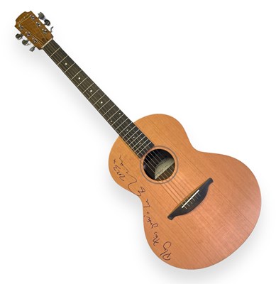 Lot 527 - ED SHEERAN - A GUITAR SIGNED FOR 'WE ARE MUSIC'.