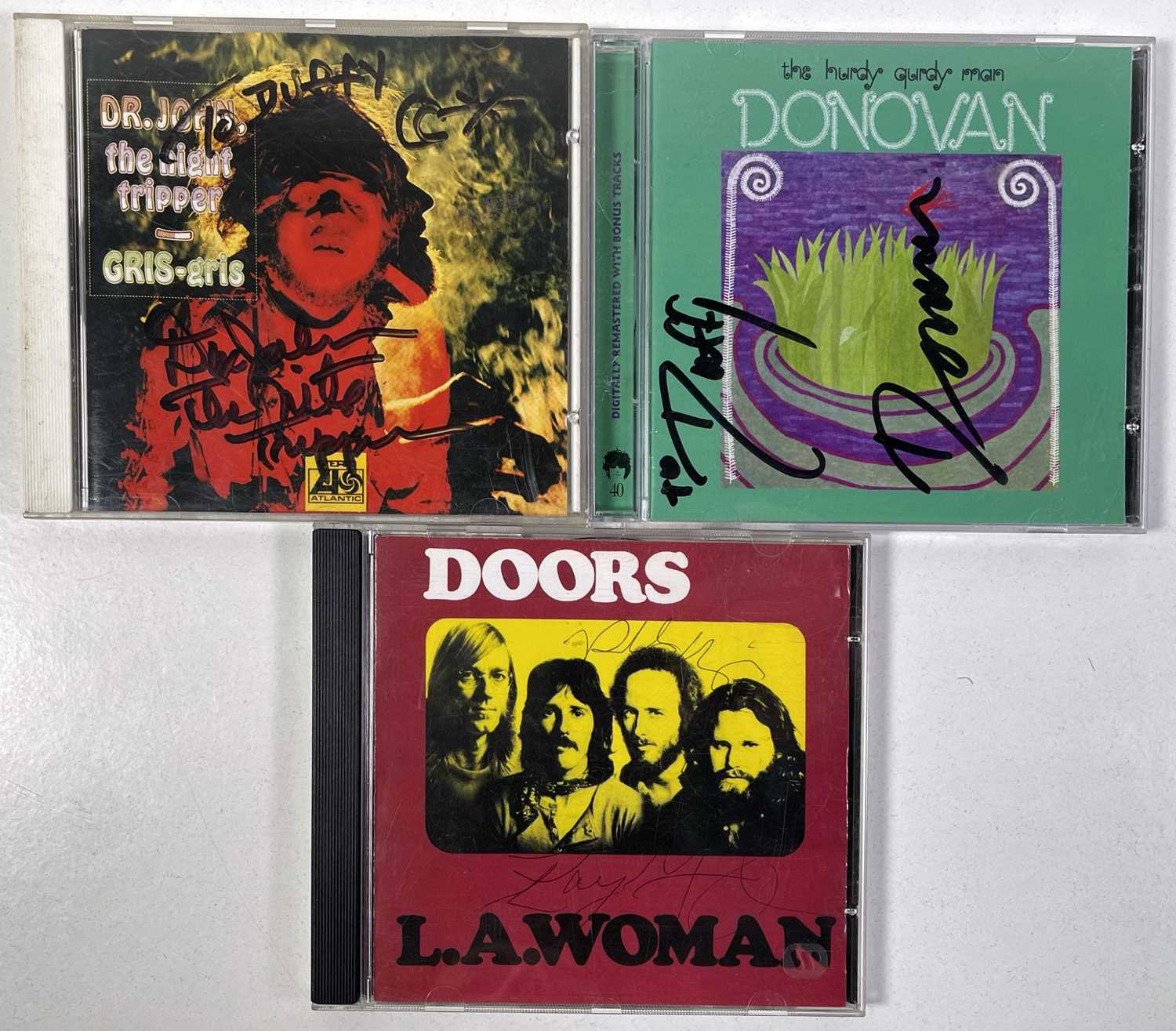 Lot 49 - SIGNED CDS INC THE DOORS.