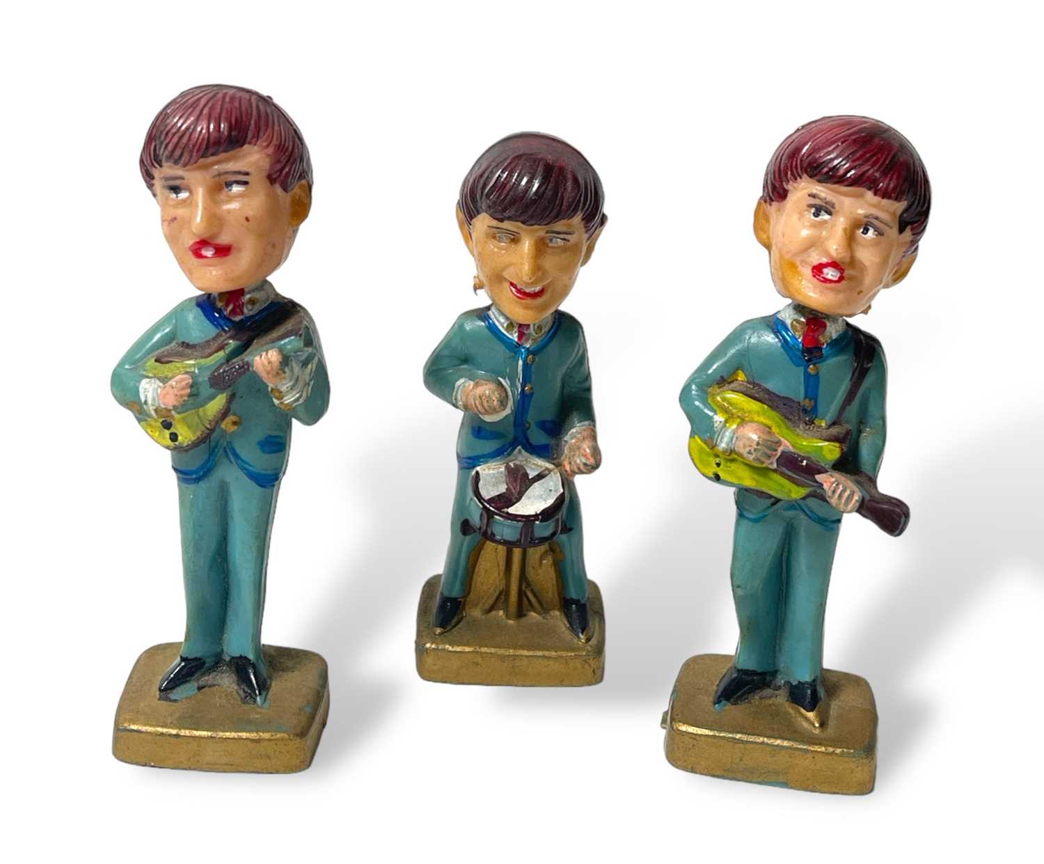 Lot 51 - THE BEATLES - 1964 'SWINGERS' NODDING HEAD DOLLS.