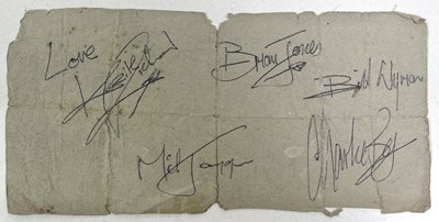 Lot 309A - THE ROLLING STONES - PAGE SIGNED BY KEITH (ON BEHALF OF OTHER MEMBERS) AND CHARLIE.