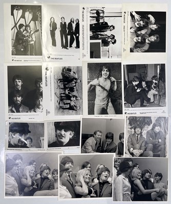 Lot 297 - 15 PHOTOGRAPHS OF THE BEATLES.