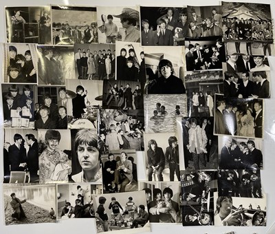 Lot 287 - THE BEATLES - NME FEATURED / STAMPED PRESS PHOTOS.