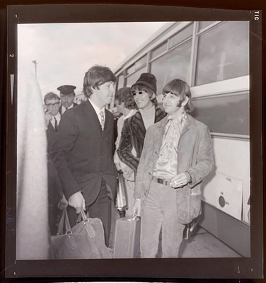 Lot 361 - THE MONTY FRESCO COLLECTION - THE BEATLES LEAVE LONDON AIRPORT FOR GERMANY, JUNE 1966 - NEGATIVES WITH COPYRIGHT.