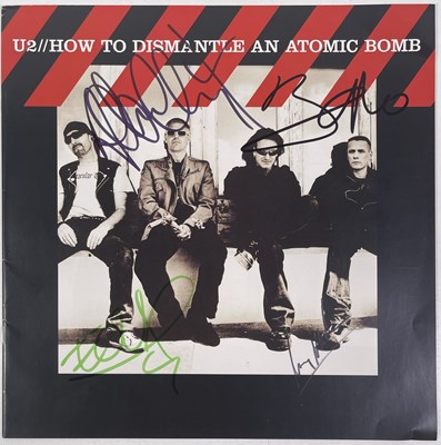 Lot 308 - U2 - HOW TO DISMANTLE AN ATOMIC BOMB - SIGNED PROGRAMME.