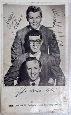 Lot 353 - BUDDY HOLLY - OWNED AND WORN BOOTS, A FULLY SIGNED POSTCARD, INTERVIEWS WITH PARENTS AND MORE.