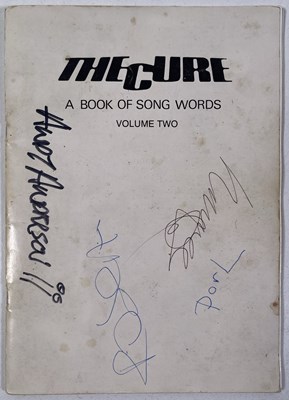 Lot 444 - THE CURE - FULLY SIGNED SONG BOOK.