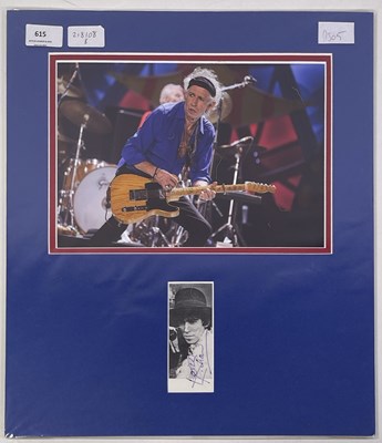 Lot 376 - THE ROLLING STONES - KEITH RICHARDS SIGNED CUTTING ON DISPLAY.