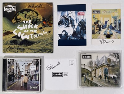 Lot 523 - OASIS - BAND MEMBER SIGNED CDS/RECORDS.