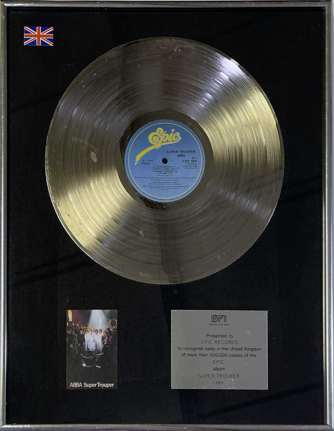 Lot 335 - ABBA - OFFICIAL SUPER TROUPER PLATINUM DISC BPI AWARD.