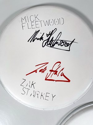 Lot 335 - SIGNED DRUMSKINS  X3 INC PHIL COLLINS.