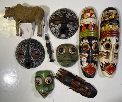Lot 5 - MASKS AND STATUES - INDONESIAN.
