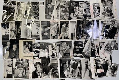 Lot 254 - ROGER MOORE - LARGE COLLECTION OF PRESS PHOTOGRAPHS.