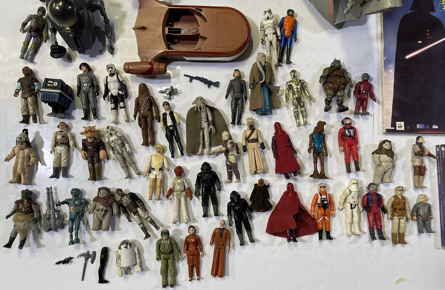 A collection of vintage Kenner Star Wars toys, to include Slave I, Rebel Transport, AT-ST, Wampa, Ta