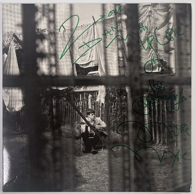 Lot 27 - PAUL MCCARTNEY - CHAOS AND CREATION IN THE BACK YARD - SIGNED BY MIKE MCCARTNEY.