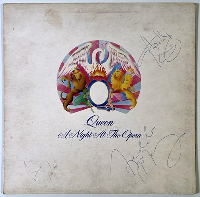 Lot 313 - QUEEN - A NIGHT AT THE OPERA SIGNED BY THREE MEMBERS.