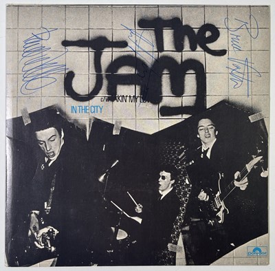 Lot 332 - THE JAM - IN THE CITY - FULLY SIGNED 7" SINGLE.