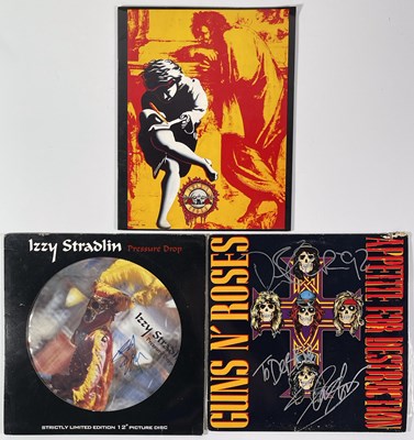 Lot 344 - GUNS N ROSES /. IZZY STRADLIN SIGNED ITEMS.