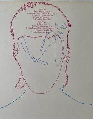 Lot 318 - DAVID BOWIE - SIGNED COPY OF ALADDIN SANE.