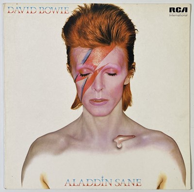 Lot 318 - DAVID BOWIE - SIGNED COPY OF ALADDIN SANE.