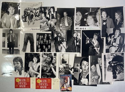 Lot 306 - THE BEATLES INTEREST - PAUL MCCARTNEY / WINGS - PRESS AND PROMO PHOTOGRAPHS IN UNUSED TICKETS.