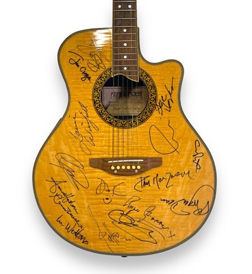 Lot 220 - KING CRIMSON INTEREST - JOHN WETTON - A GUITAR SIGNED BY MANY STARS.