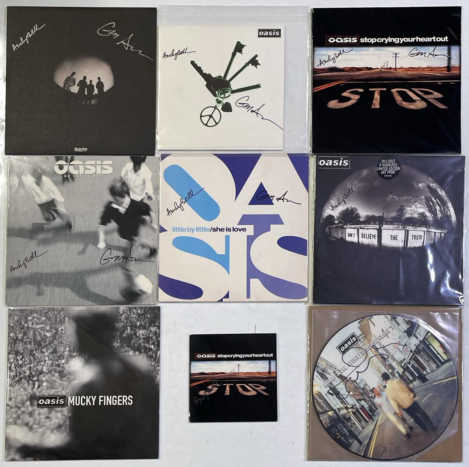 Lot 342 - OASIS - BAND MEMBER SIGNED RECORDS.