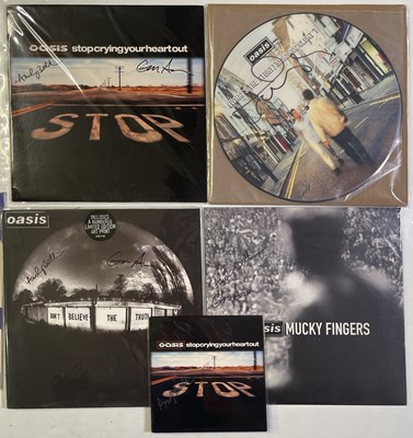 Lot 342 - OASIS - BAND MEMBER SIGNED RECORDS.
