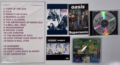 Lot 547 - OASIS - SETLIST AND SIGNED ITEMS.