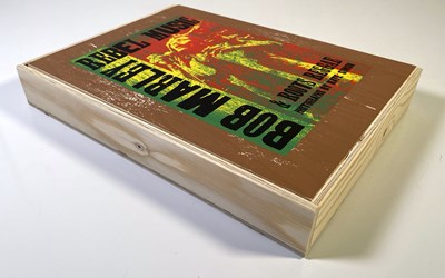 Lot 89 - BOB MARLEY REBEL MUSIC GENESIS PUBLICATIONS - DELUXE COPY SIGNED BY ERIC CLAPTON.