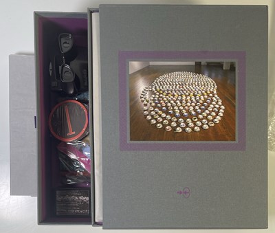 Lot 108 - GENESIS PUBLICATIONS - STORM THORGERSON - TAKEN BY STORM - DELUXE.