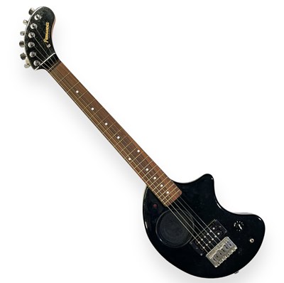 Lot 52 - FERNANDES ZO-3 ELECTRIC MINI GUITAR WITH IN-BUILT AMP - BLACK - PRETENDERS CONNECTION.