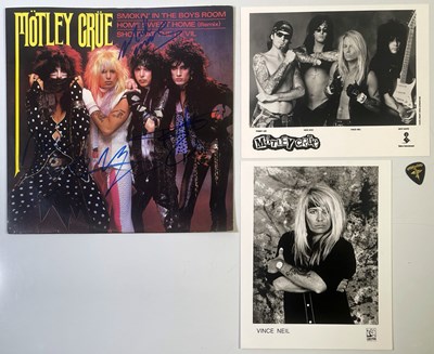 Lot 309 - MOTLEY CRUE - FULLY SIGNED 12".