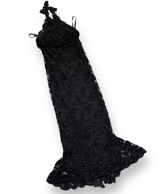 Lot 594 - DAME SHIRLEY BASSEY - OWNED AND WORN SEQUINNED BLACK DRESS.