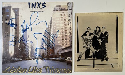 Lot 320 - INXS - FULLY SIGNED 12".