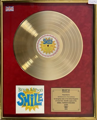 Lot 363 - BEACH BOYS INTEREST - BRIAN WILSON - OFFICIAL BPI GOLD DISC AWARD FOR 'SMILE'.