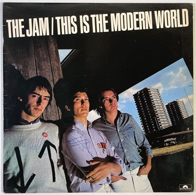 Lot 530 - THE JAM - ..MODERN WORLD - FULLY SIGNED COPY.