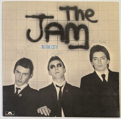 Lot 507 - THE JAM - SIGNED COPY OF IN THE CITY.