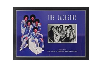 Lot 361 - THE JACKSONS - SIGNED AND FRAMED DISPLAY.