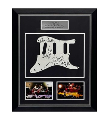 Lot 368 - THE STOOGES - SIGNED GUITAR PICKGUARD IN FRAMED DISPLAY.