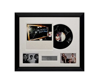 Lot 371 - ARCTIC MONKEYS- FRAMED AND SIGNED DISPLAY.