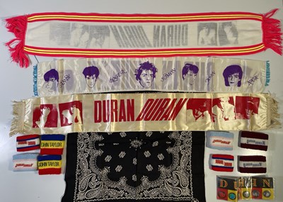 Lot 519 - DURAN DURAN - ORIGINAL PATCHES / PIN BADGES / CONCERT SCARF COLLECTION.