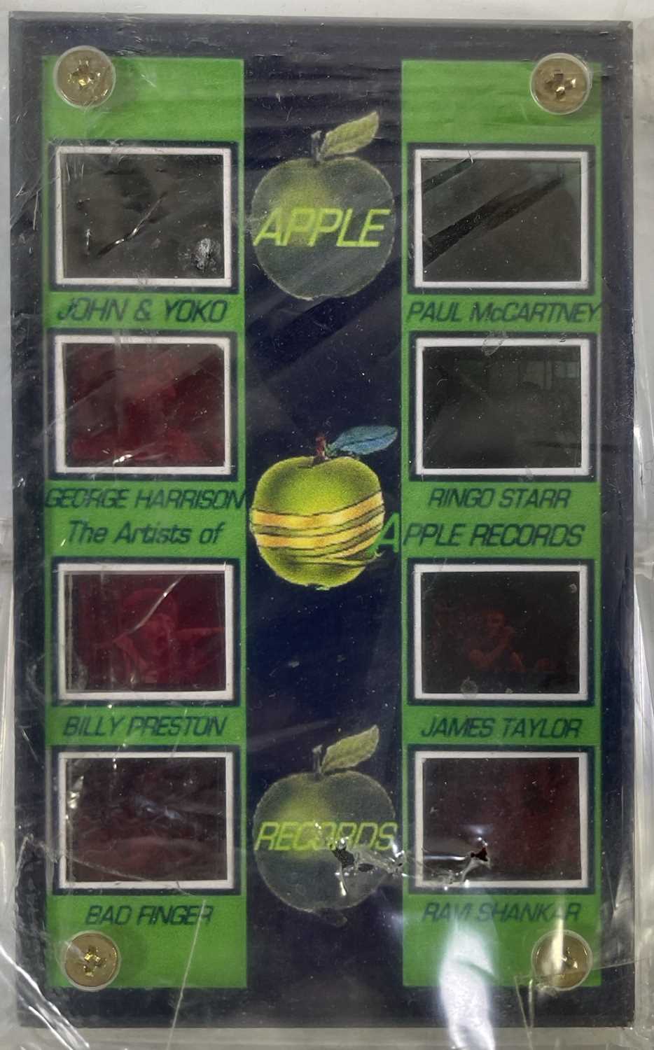 Lot 220 THE BEATLES APPLE RECORDS MEMORABILIA.